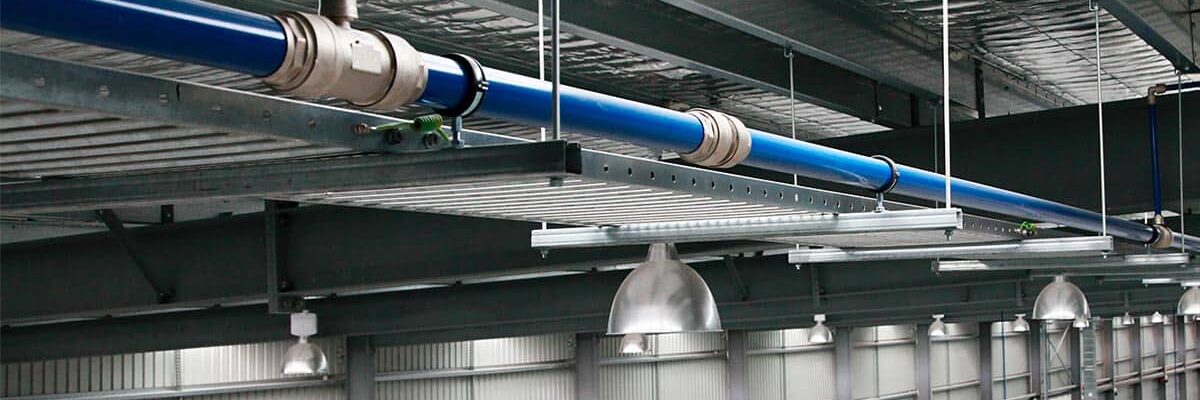 infinity pipe installed on an industrial commercial ceiling infinity pipe installed on an industrial commercial ceiling