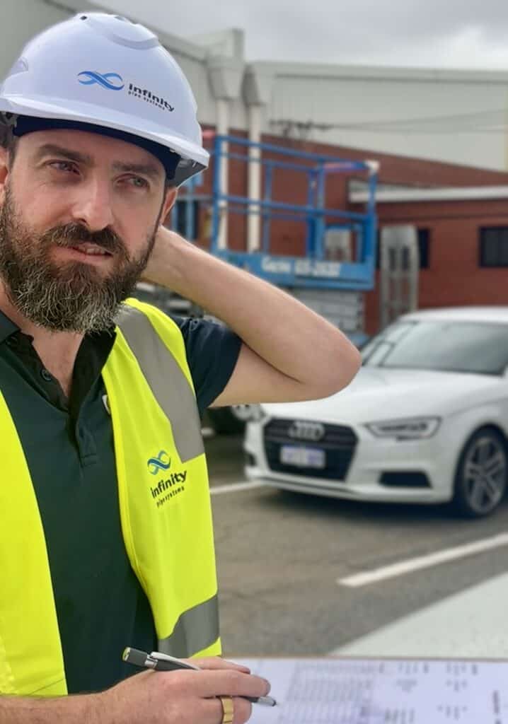 infinity team member wearing hi vis and ppe